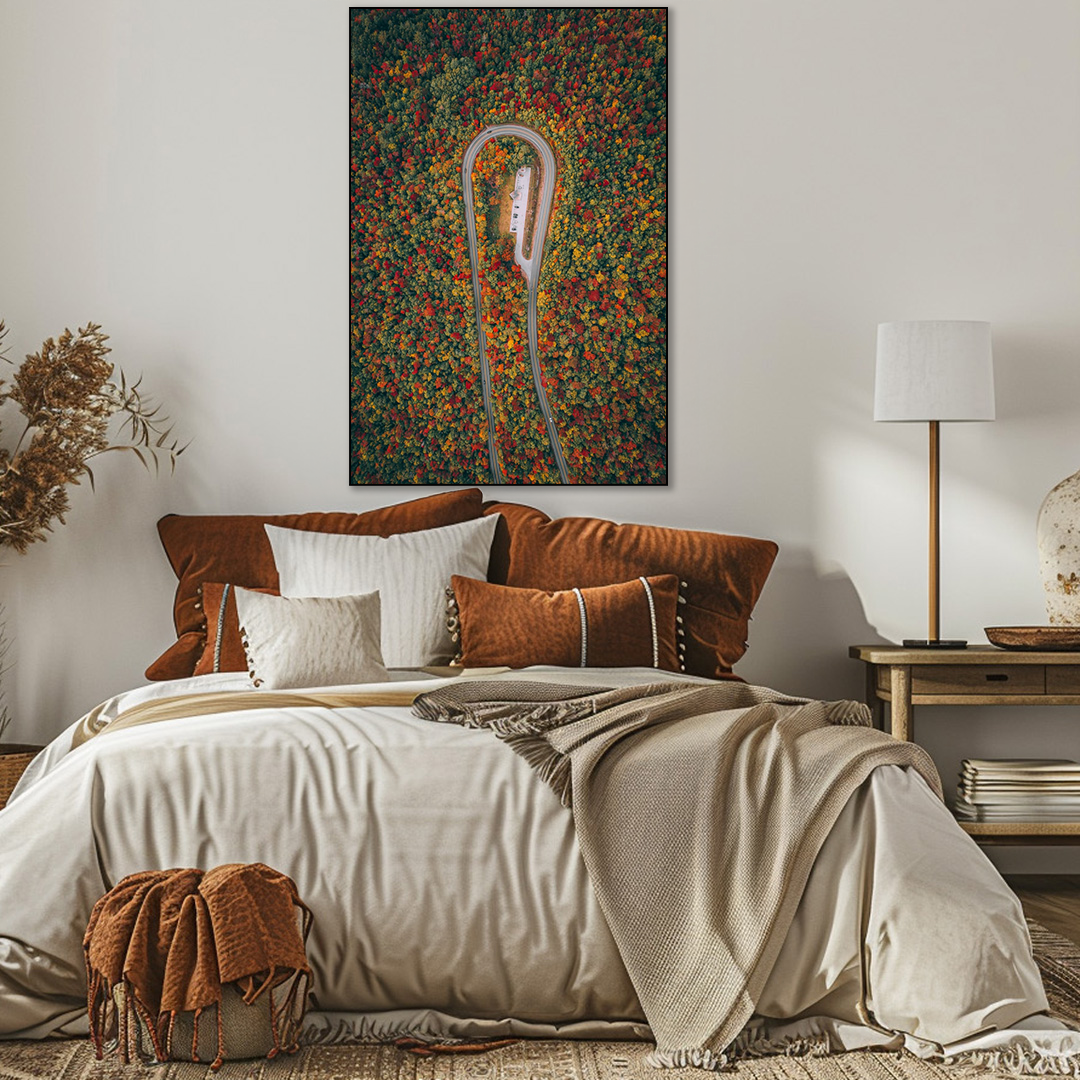 Cozy bedroom with a bed, decorative pillows, and a colorful abstract painting on the wall.