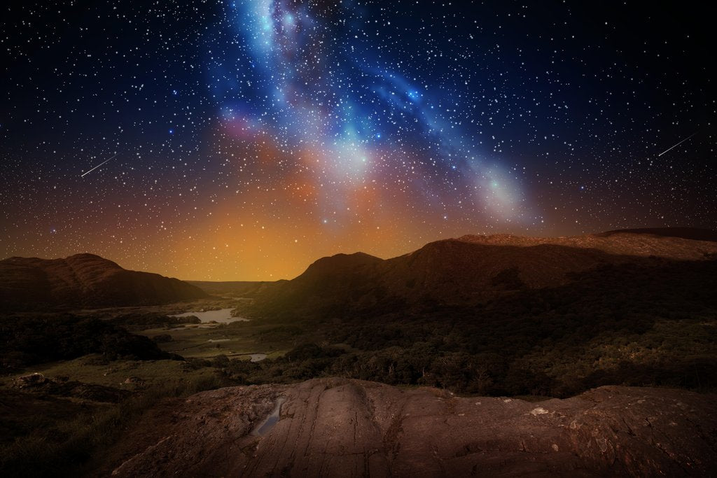Stock Photos - nature and astronomy concept - mountain landscape over night sky or space with shooting stars background. mountain landscape over night sky or space
