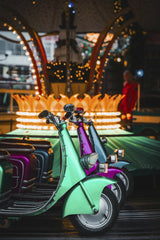 Christiyana - Vibrant Vespas parked at L√ºneburg Christmas market creating festive ambiance.