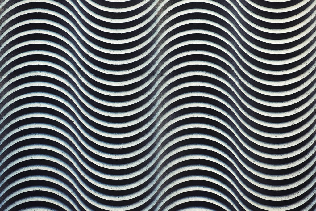 Tim Mossholder - Monochrome abstract wave pattern creating a hypnotic design with repetition and depth.