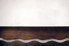 Tim Mossholder - Minimalist wooden wave pattern on a light background, ideal for interior design concepts.