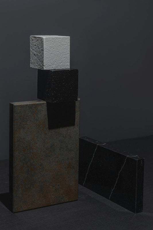 Mikhail Nilov - Abstract geometric composition of stone blocks with textured surfaces.