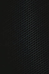 Eva Bronzini - Close-up of a dark patterned surface with a mesh texture in Estonia.