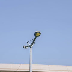 aboodi vesakaran - A vertical shot of a street lamp with a clear blue sky background in Dubai, UAE.
