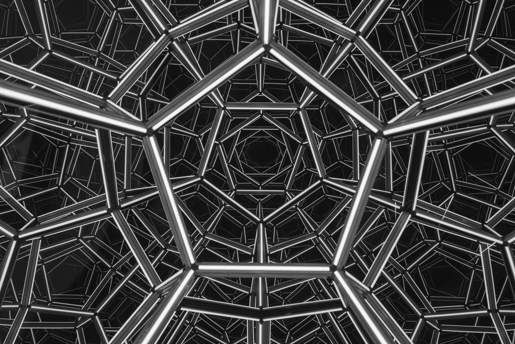 Vladimir Srajber - Intricate metal geometric pattern with modern abstract design, creating a complex visual effect.