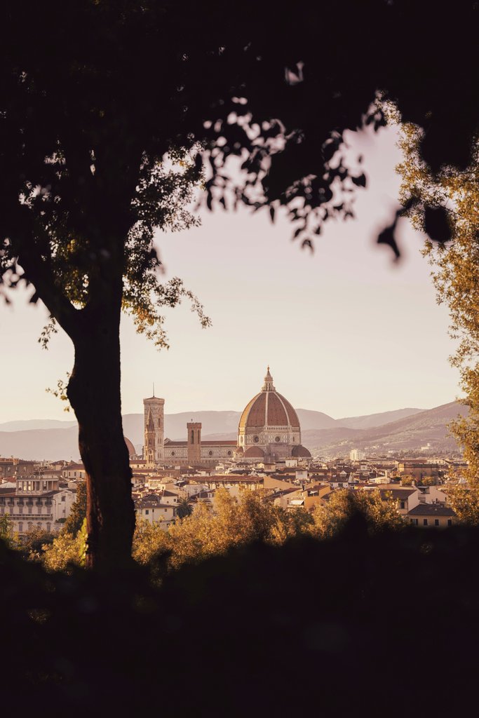 Jean-Baptiste Terrazzoni - Scenic view of Florence Cathedral with autumn trees, captured at sunset in Tuscany, Italy.