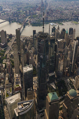 Trev W. Adams - Stunning aerial view of New York City skyline featuring One World Trade Center and surrounding skyscrapers.