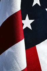 Eyes2Soul Eyes2Soul - A detailed close-up view of the American flag showcasing stars and stripes, symbolizing patriotism.