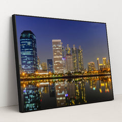 Nighttime Bangkok's Riverfront Skyline by Anonymous - Black Frame Stretchiez