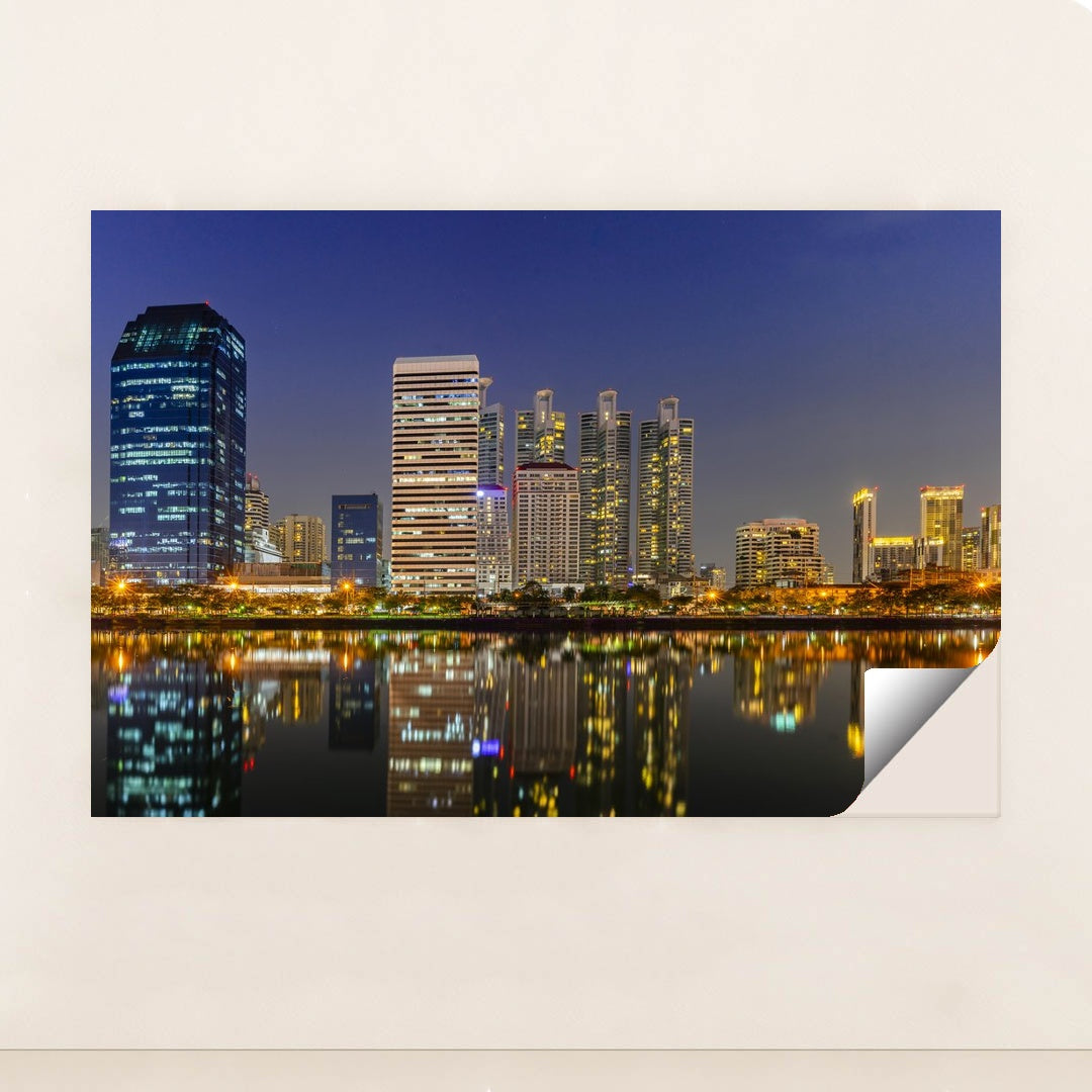 Nighttime Bangkok's Riverfront Skyline by Anonymous - Peeliez