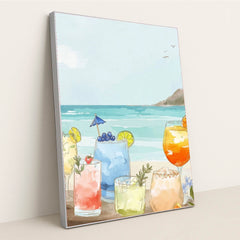 Coastal Sips features colorful summer cocktails on a beach with waves, displayed in a silver frame