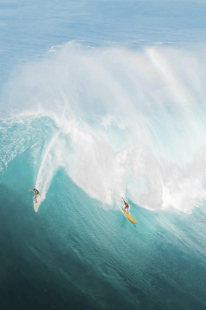 Big Wave Surfing at Waimea Bay by Jess Loiterton