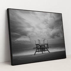 Lonely Pier Under Cloudy Skies by Engin Akyurt - Black Frame Stretchiez