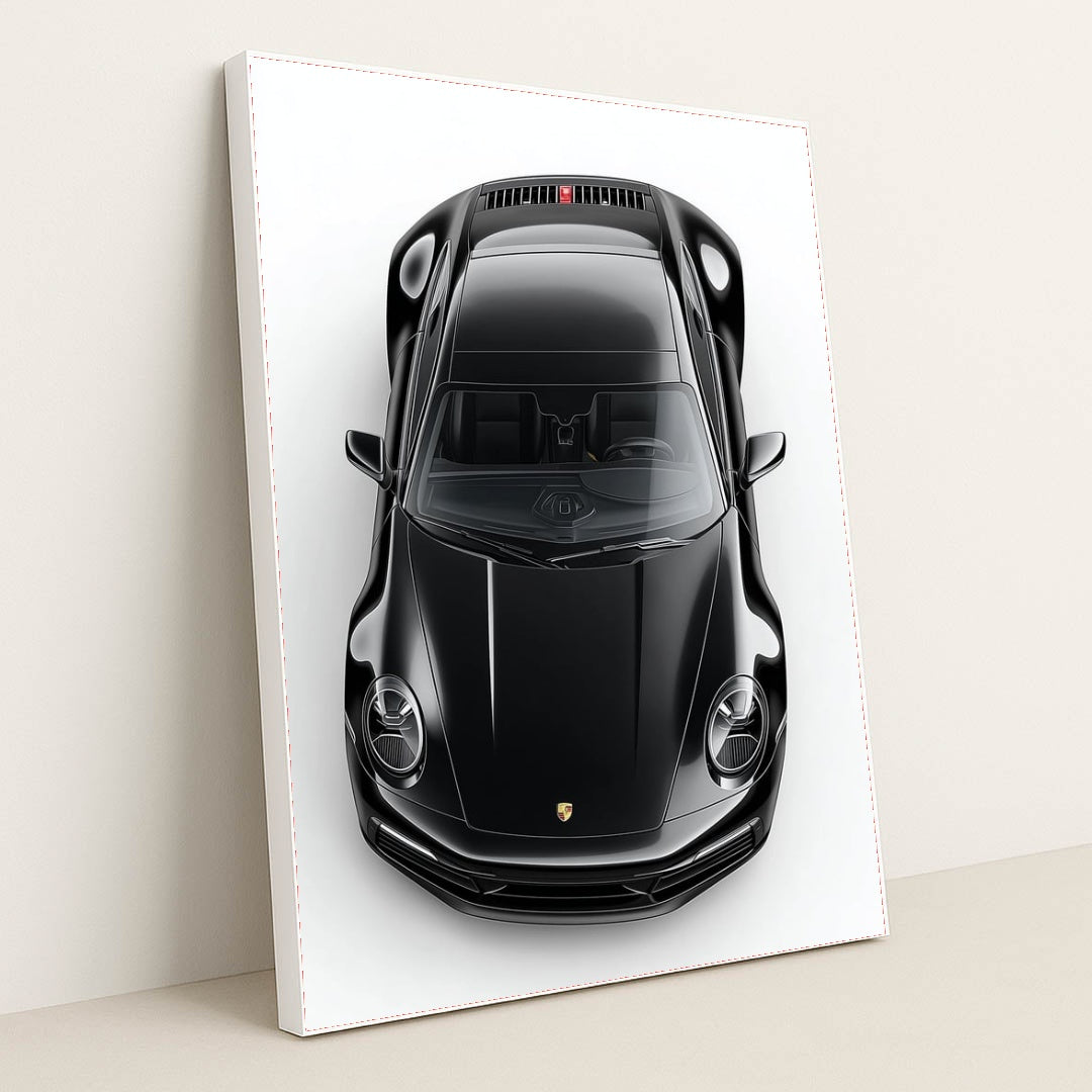 This photo shows a top-down view of a black Porsche 911 against a white background, in a white frame.