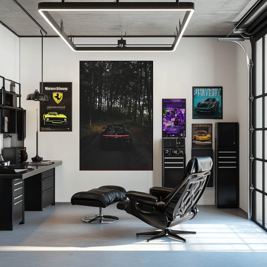 Porsche 911 Taillight Glow in the Woods car wall art displayed in a stylish modern workspace with other car posters.