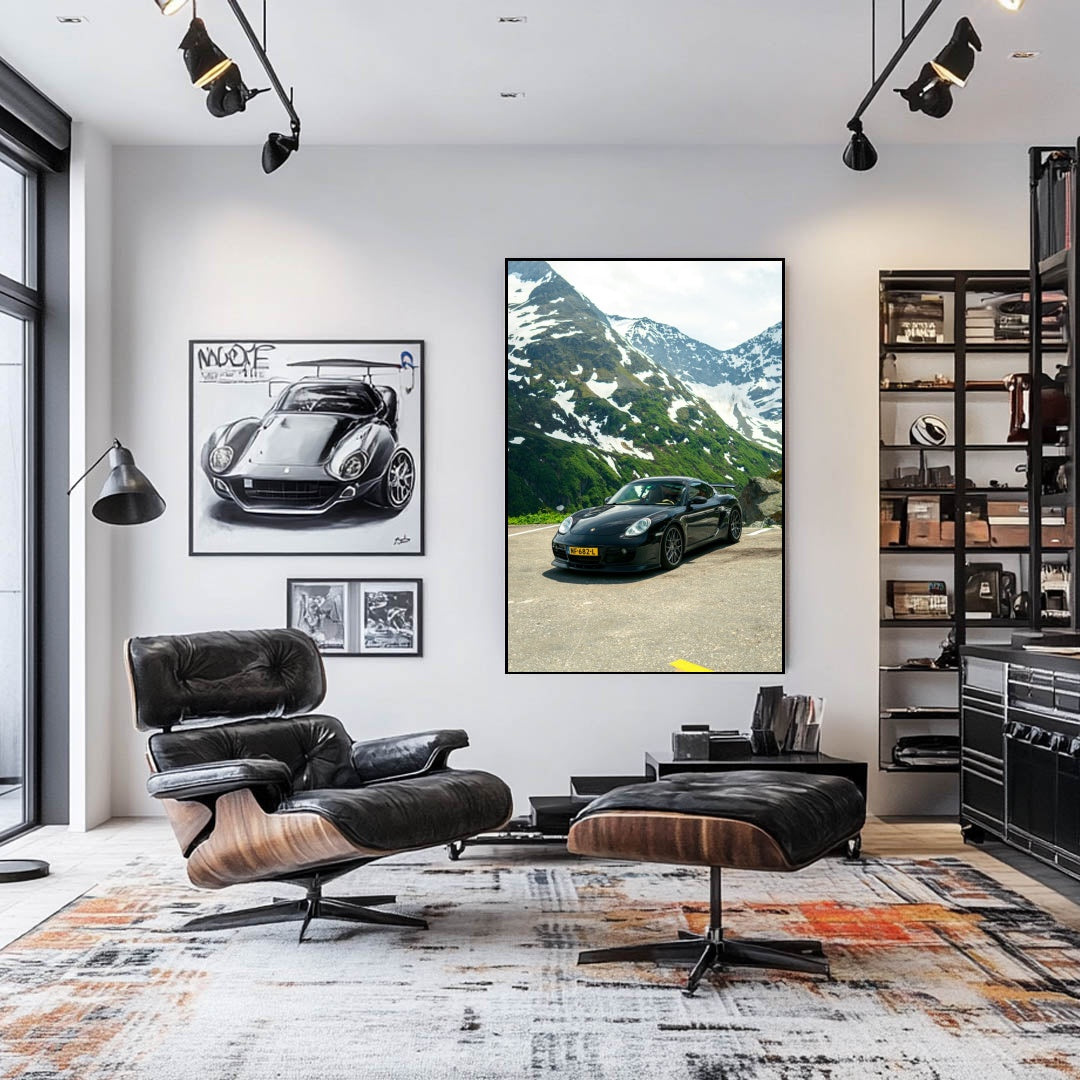 Beautiful Black Porsche Cayman in the Alps showcased in a modern living room with chic decor, perfect car wall art.