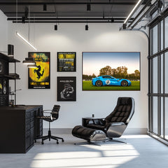 Ferrari F12tdf Sunset Glow displayed as car wall art in a modern office space with stylish furniture.