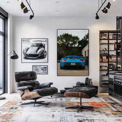 Porsche Carrera GT in Blue Steel Silence wall art displayed in a stylish modern living room.