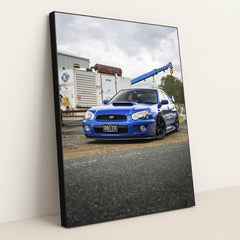 Blue Subaru WRX STI in Industrial Setting by Martynas Linge - Black Frame Stretchiez