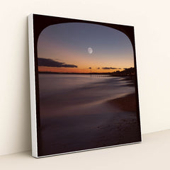 Moonlit Evening View Under Bournemouth Pier with Illuminated Coastline by Mohammad Abbasi - White Frame Stretchiez