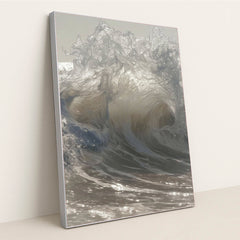 This artwork shows crashing ocean waves with swirling light and texture, in a silver frame.