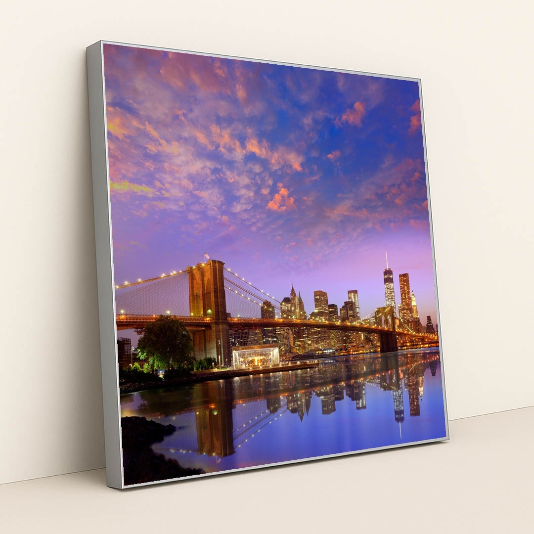 Stunning Sunset Over Brooklyn Bridge and Manhattan Skyline by Anonymous - Silver Frame Stretchiez