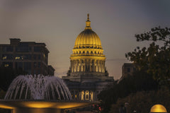 Mike Norris - The Wisconsin State Capitol illuminated during twilight, showcasing its architectural beauty.