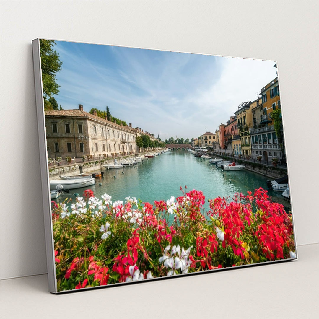 Flower-Lined Canal in an Italian Town by Getty Images - Silver Frame Stretchiez