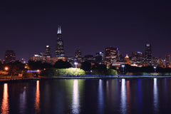 Stock Photos - Chicago night skyline across Lake Michigan.