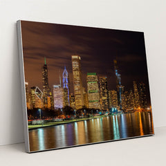 Sunset Reflections: Chicago's Urban Skyline Over Lake Michigan by Anonymous - Silver Frame Stretchiez