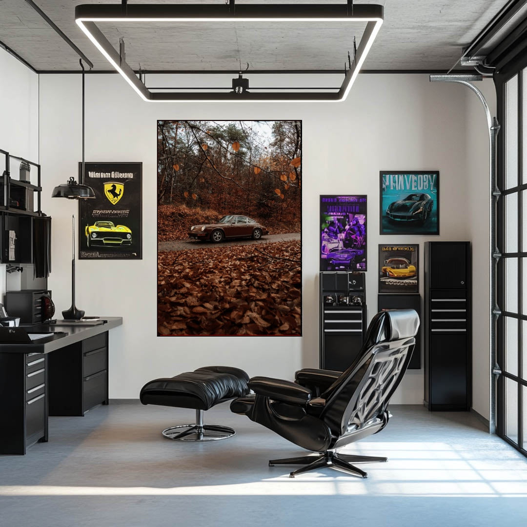 Vintage Porsche Among Fall Leaves car wall art displayed in a modern workspace with posters and a stylish chair.