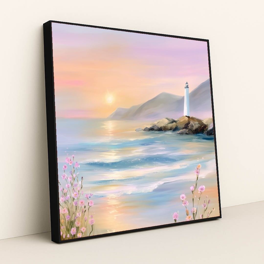 This artwork features a pastel seascape at sunset with a lighthouse on rocky cliffs and pink wildflowers, in a black frame.