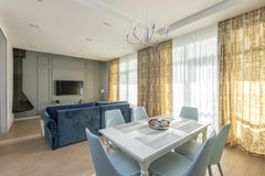Max Vakhtbovycn - Bright contemporary living room with luxurious furnishings and elegant decor.