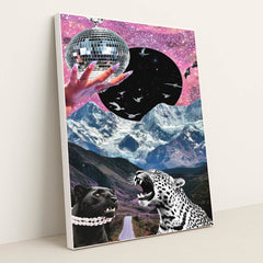 This artwork shows a surreal collage of a jeweled hand holding a disco ball, starry sky, soaring birds, snowy mountains, and two leopards, in a white frame.