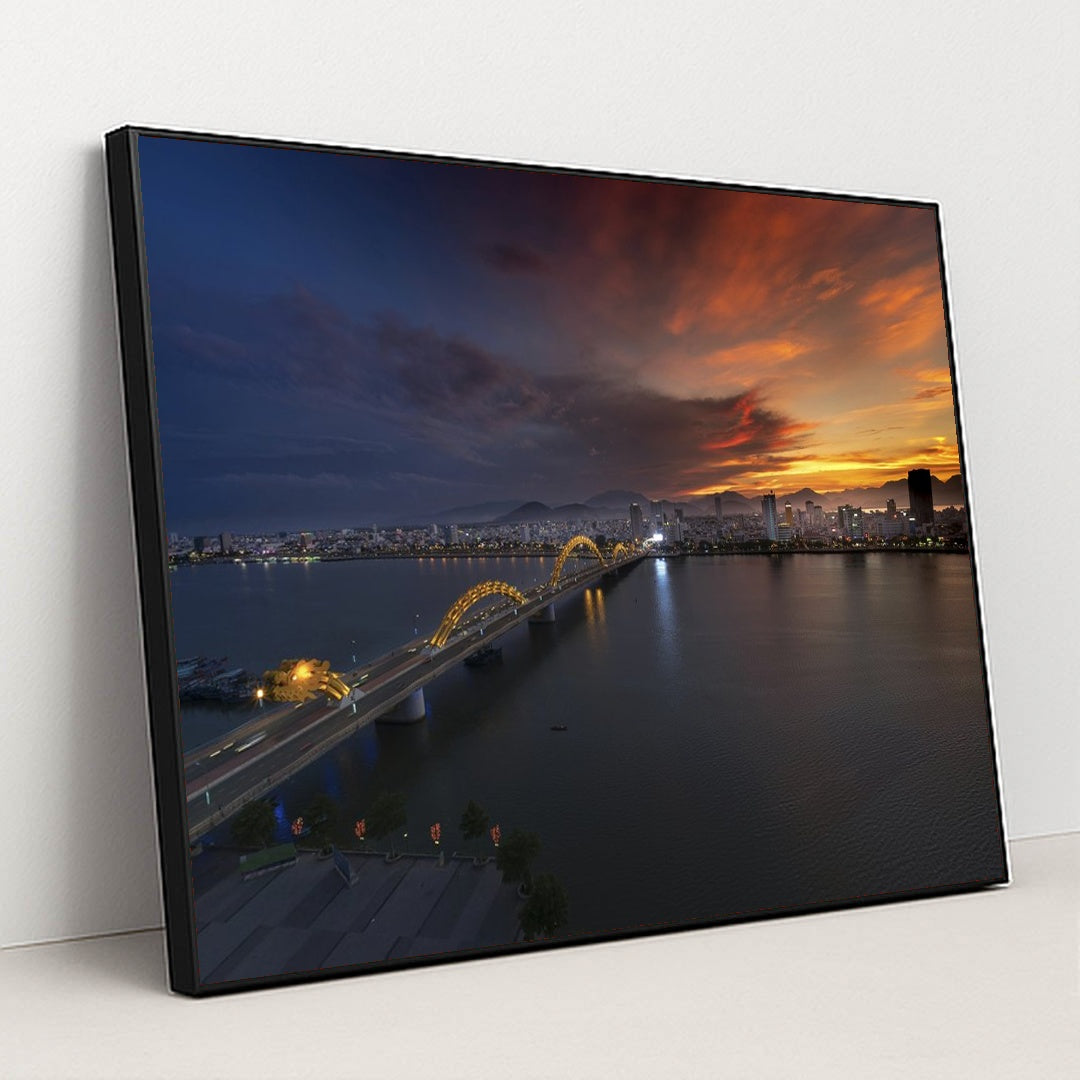 Sunset Over Dragon Bridge in Da Nang by Quang Nguyen Vinh - Black Frame Stretchiez
