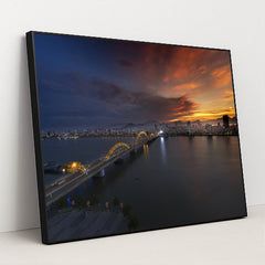 Sunset Over Dragon Bridge in Da Nang by Quang Nguyen Vinh - Black Frame Stretchiez