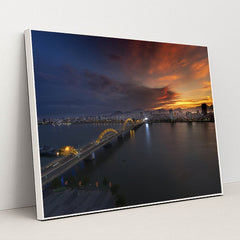 Sunset Over Dragon Bridge in Da Nang by Quang Nguyen Vinh - White Frame Stretchiez