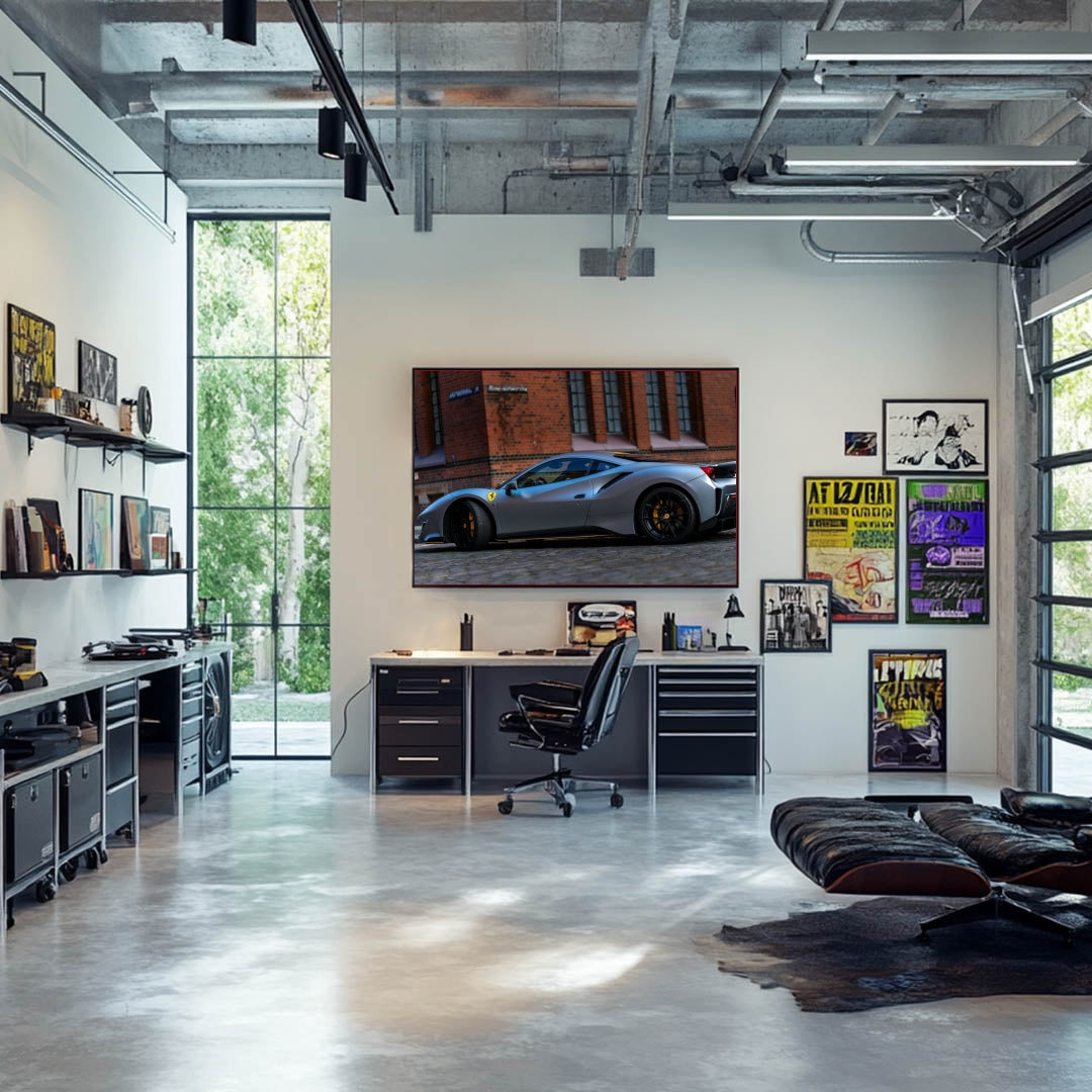 Stylish office featuring a Ferrari 488 GTB in Silver Shine wall art displayed on a modern TV.