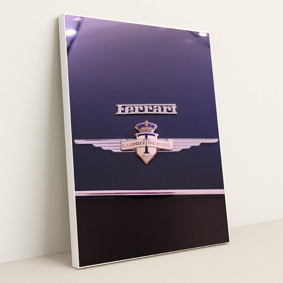This photo shows a close-up of a classic Ferrari badge and Carrozzeria Touring Milano emblem on a dark car hood, in a white frame.