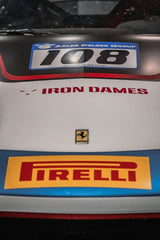 Close-up of Ferrari 108 Iron Dames showcasing sponsor decals and sleek design, perfect for car wall art.