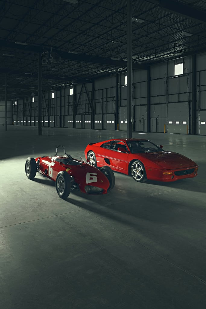 Ferrari 512 TR Meets F355 Berlinetta displayed in an industrial warehouse, showcasing iconic car wall art.
