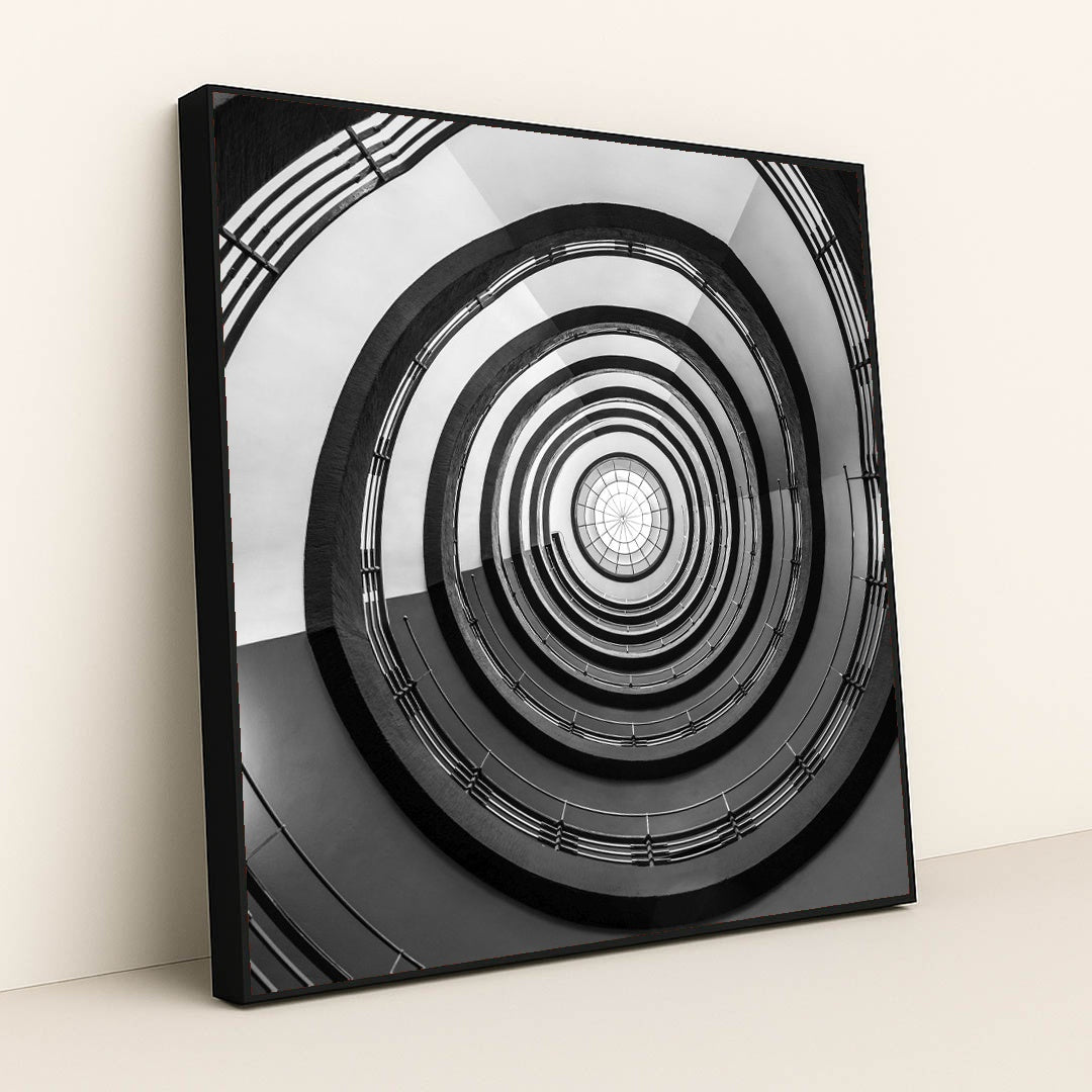 Geometric Spiral Staircase in Monochrome by Wolfgang Weiser - Black Frame Stretchiez