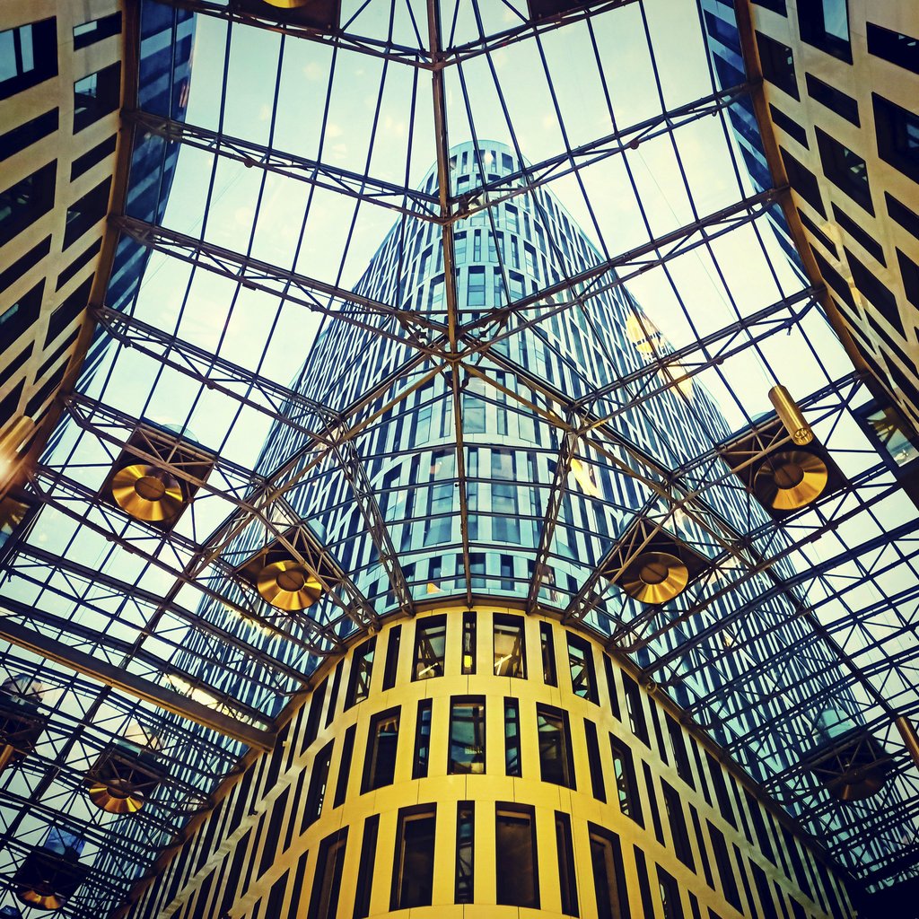 Paweł Gosk - Glass and steel atrium in Warsaw showcasing modern architectural design.