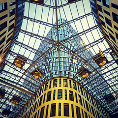 Paweł Gosk - Glass and steel atrium in Warsaw showcasing modern architectural design.