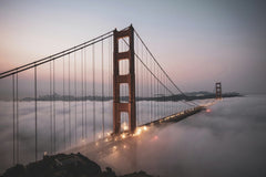 Stephen Leonardi - Stunning aerial view of the Golden Gate Bridge enveloped in morning fog.