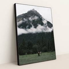 Horses Grazing on Meadow beneath Misty Mountain and Pine Forest by tee Lau - Black Frame Stretchiez