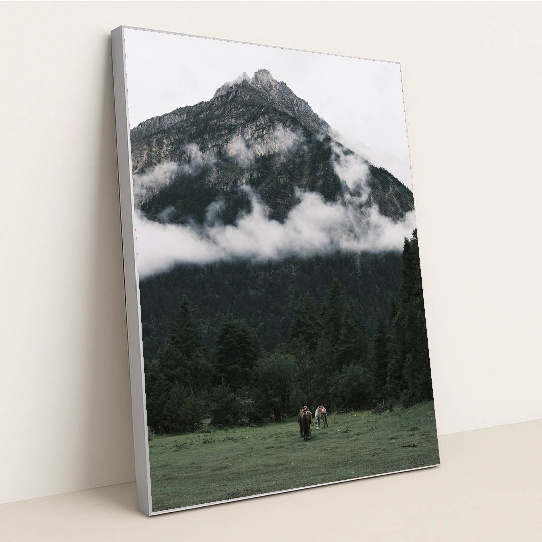 Horses Grazing on Meadow beneath Misty Mountain and Pine Forest by tee Lau - Silver Frame Stretchiez