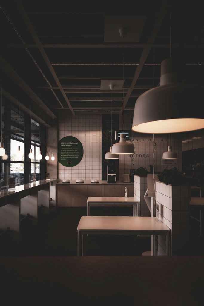 Patrice Werner - Chic industrial cafe with minimalist design in Berlin. Ideal for contemporary interior design concepts.