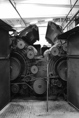 Sylvain Lelong - Black and white photo featuring intricate industrial machinery with a vintage feel.