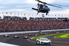 Indy 500 2025 — Pace Car Leads the Field Under Helicopter Flyover by Jeff Hilliker